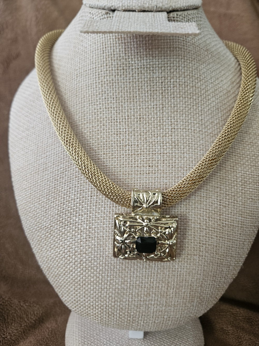 Gold Floral Pendant Necklace with Black Stone